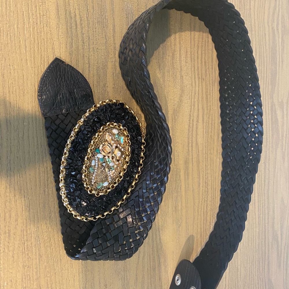 Designer belt with interchangeable buckle.